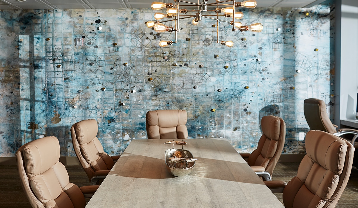 a living room filled with furniture and a large window