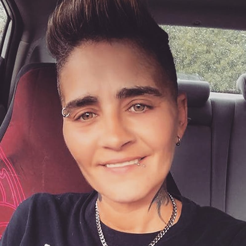 a young boy who is smiling at the camera